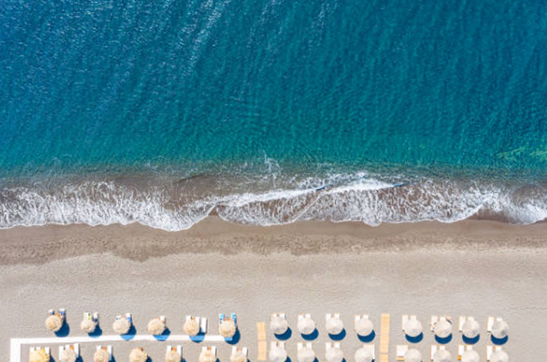 Aerial view of the sandy beach and Adriatic Sea in Golem, Albania.